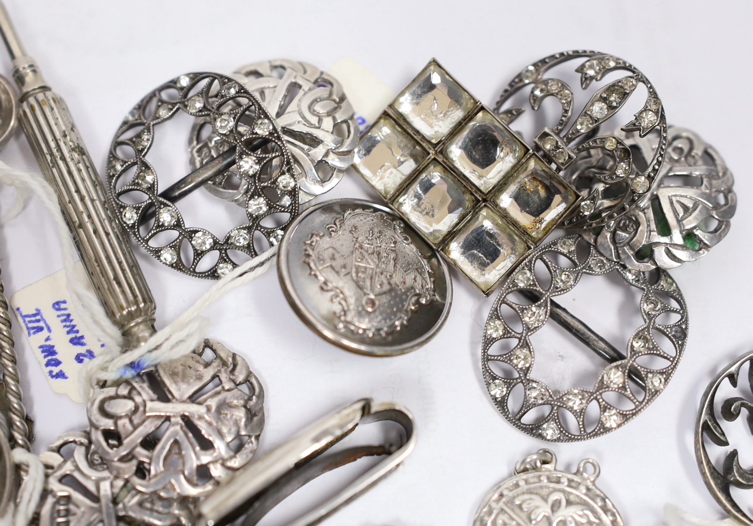 A pair of paste set 925 shoe buckles, 31mm, a George V silver bracelet, a set of four Edwardian silver buttons, two paste set white metal buttons, a Victorian silver patent clip, a Georgian silver candle sconce and eight